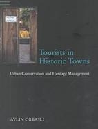 Tourists in Historic Towns Urban Conservation and Heritage Management cover